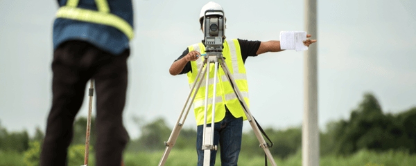 man-surveying-for-land-safety